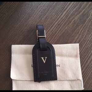 Louis Vuitton small brown luggage tag